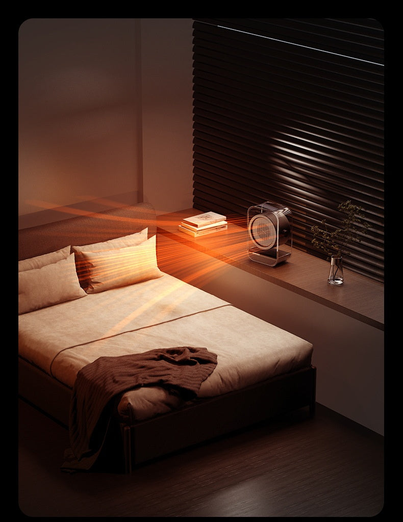 Small clear fan heater on a desk