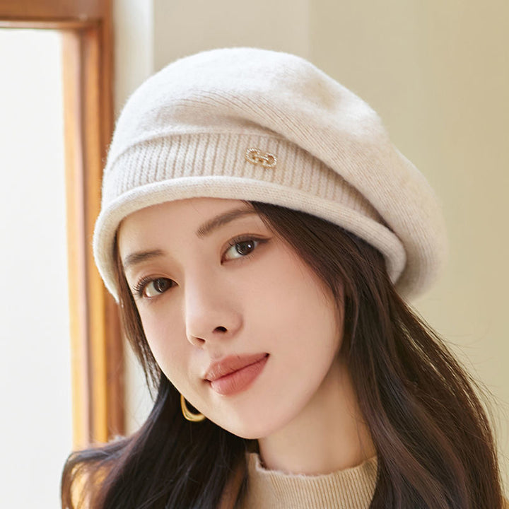 Off-white knitted beret with folded brim