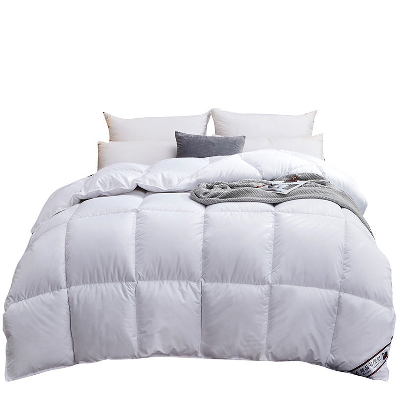 Quilted winter duvet on a bed
