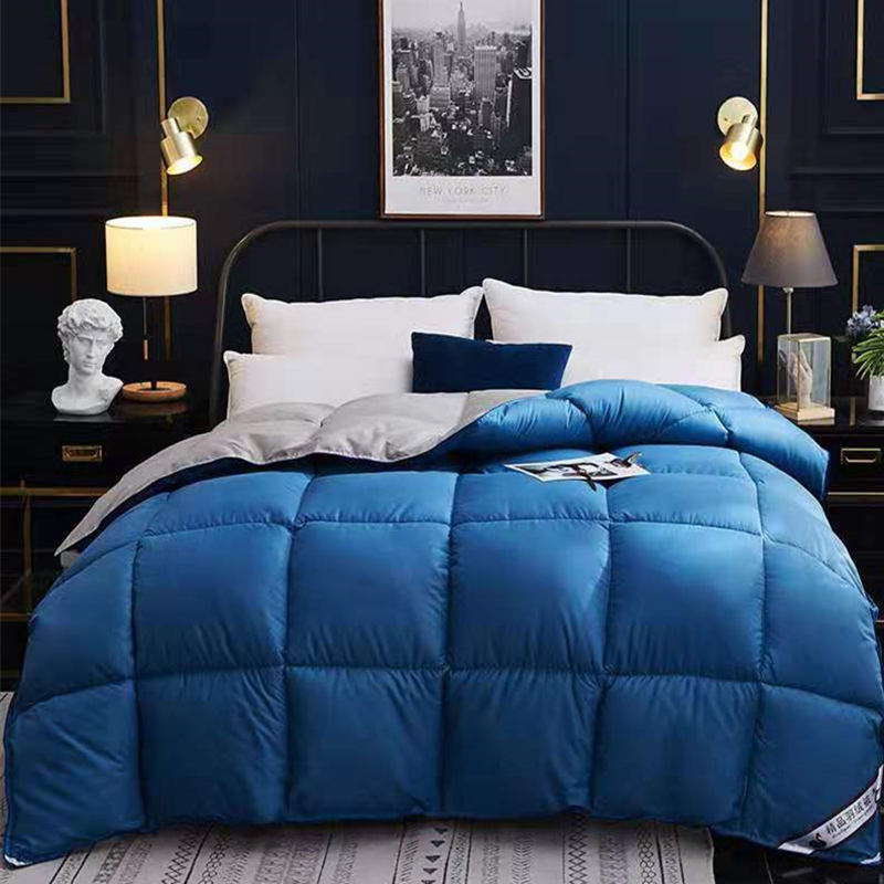 Quilted winter duvet on a bed