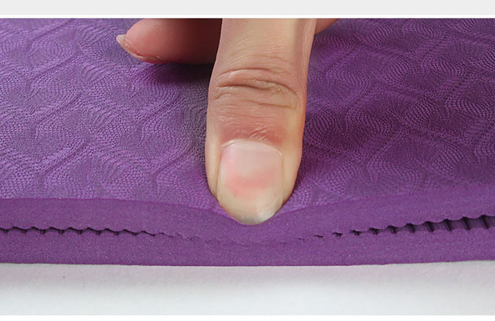 Non-slip yoga mat with alignment lines