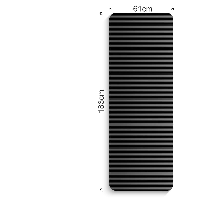 Thick grey exercise mat rolled with carry strap