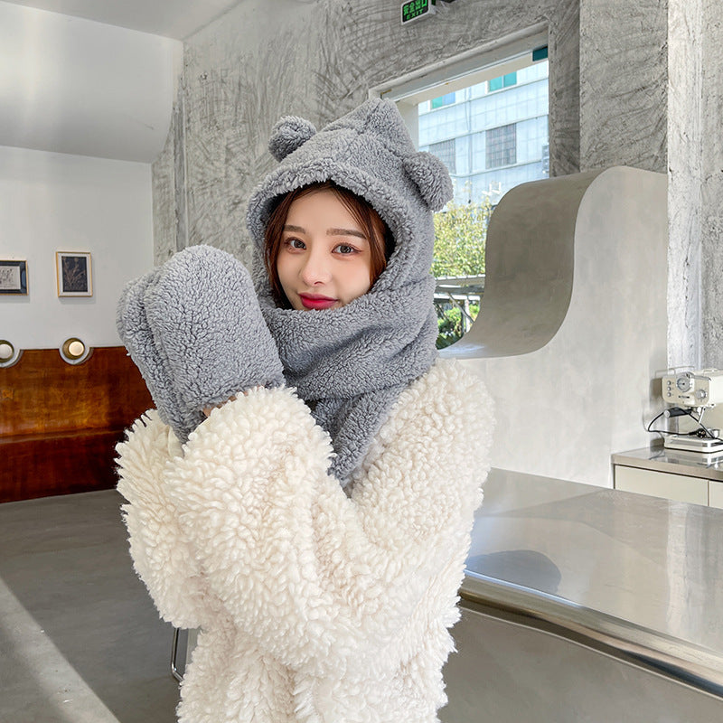 Woman wearing teddy hood scarf with bear ears