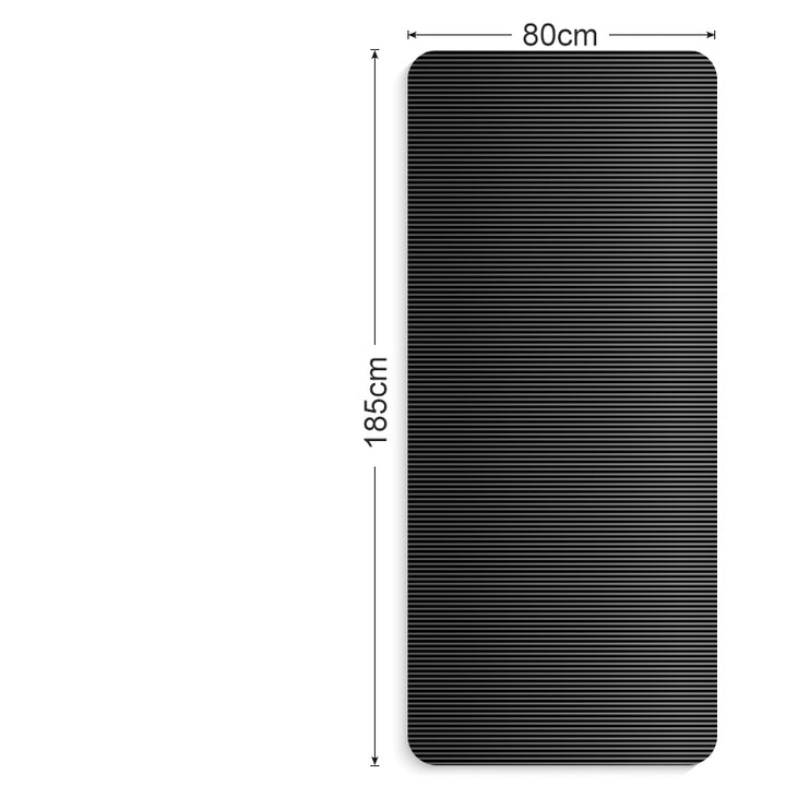 Thick grey exercise mat rolled with carry strap