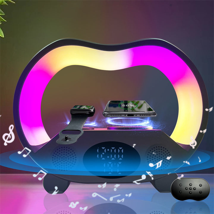 Lamp with speaker charging phone at bedside