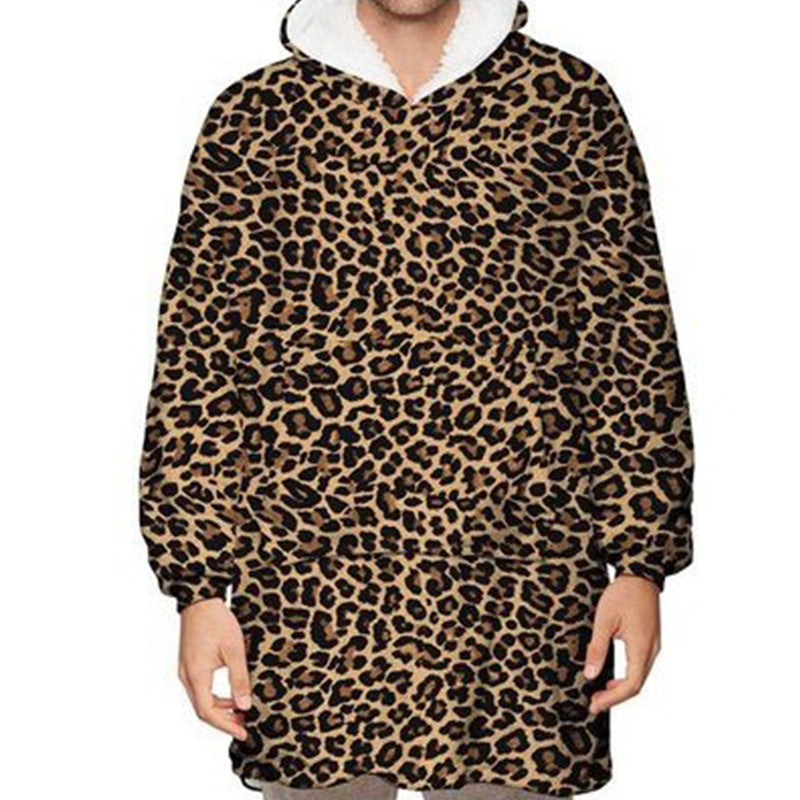Person wearing oversized panda hooded blanket