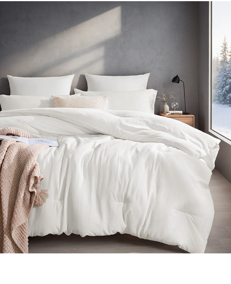 White box-stitched duvet on bed
