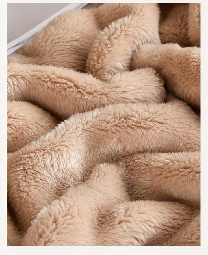 Sage green bubble fur blanket with black trim