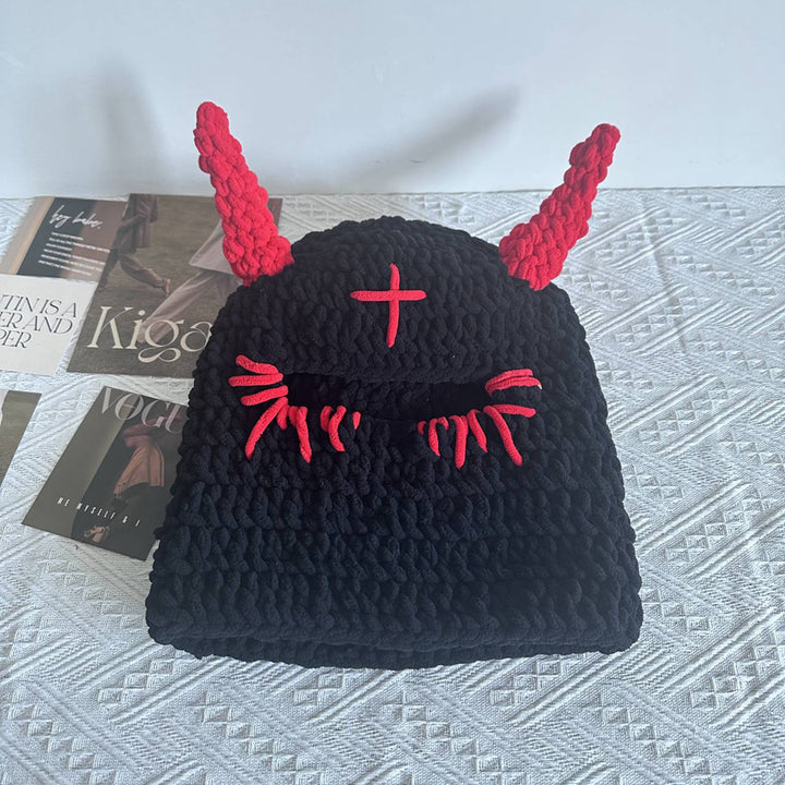Black crochet bucket hat with pink horns
