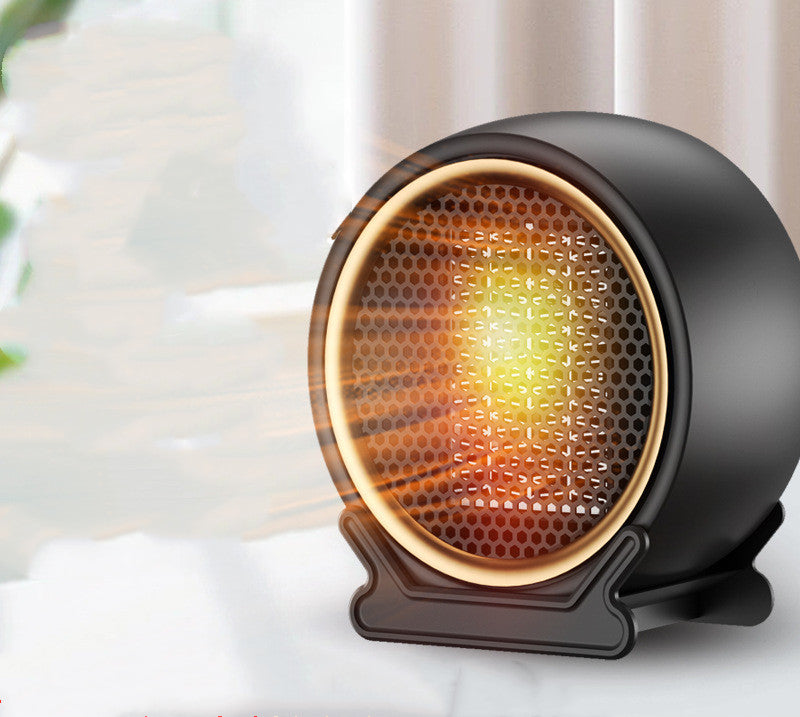 Compact round black ceramic fan heater