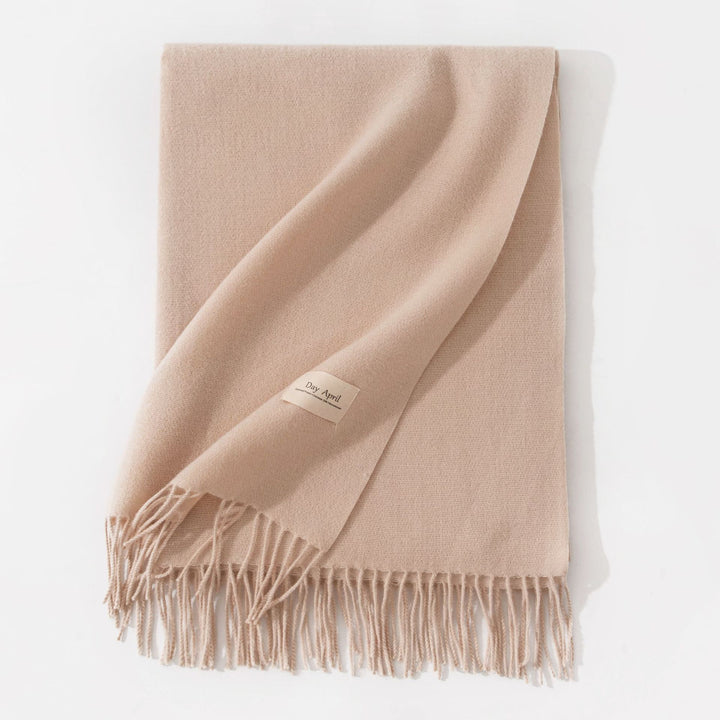Woman wearing wide soft shawl scarf