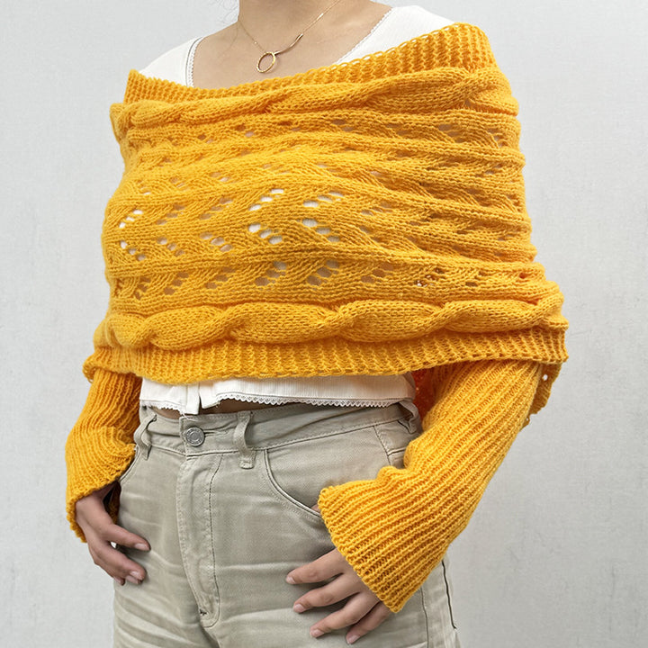 Woman in knitted shrug shawl with sleeves