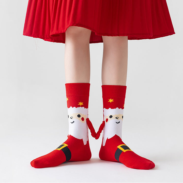 Christmas socks with magnetic hands linked
