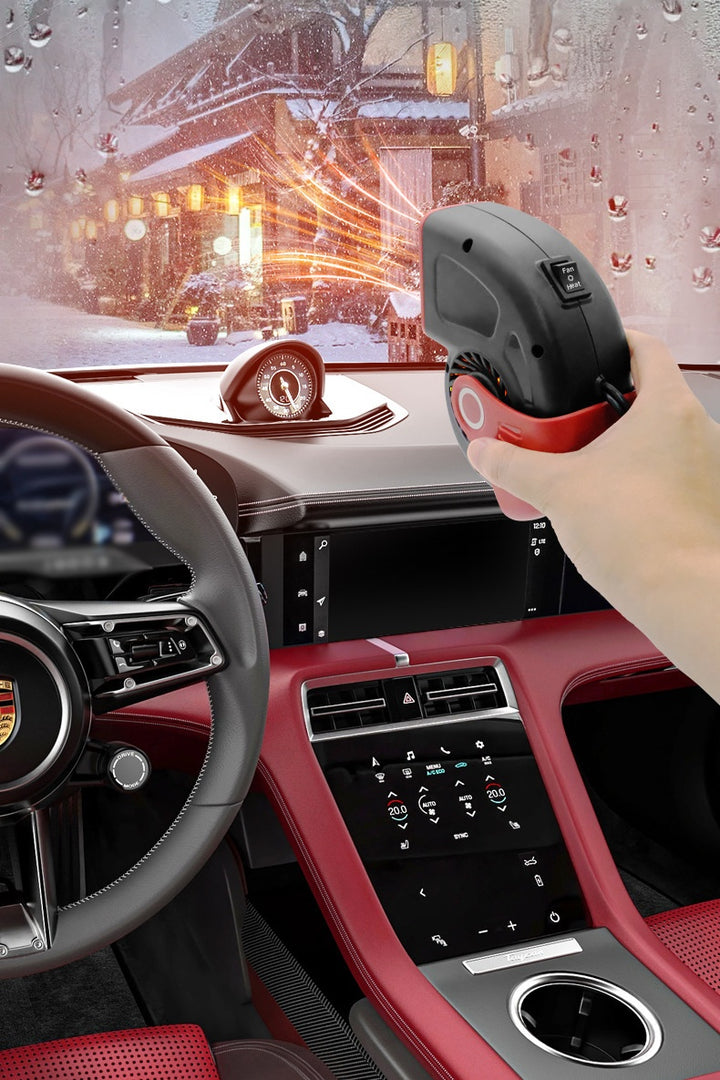 Black portable car heater on dashboard