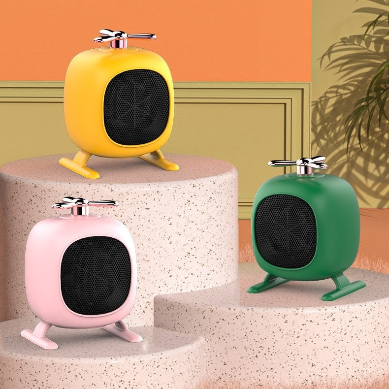 Yellow helicopter-shaped mini fan heater