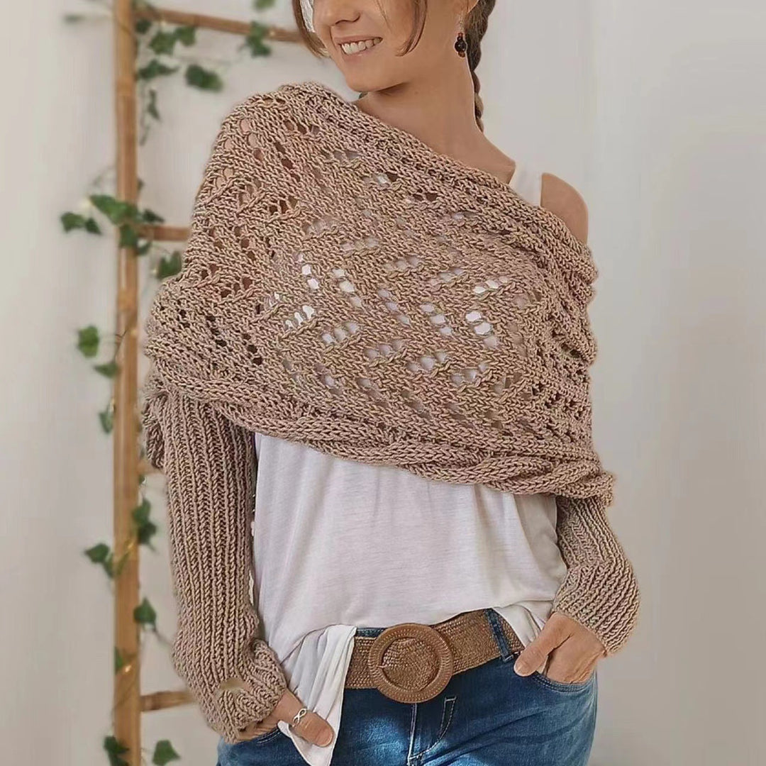 Woman in knitted shrug shawl with sleeves
