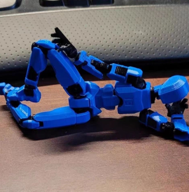 Cosycombe 3D-printed poseable robot figure with accessories