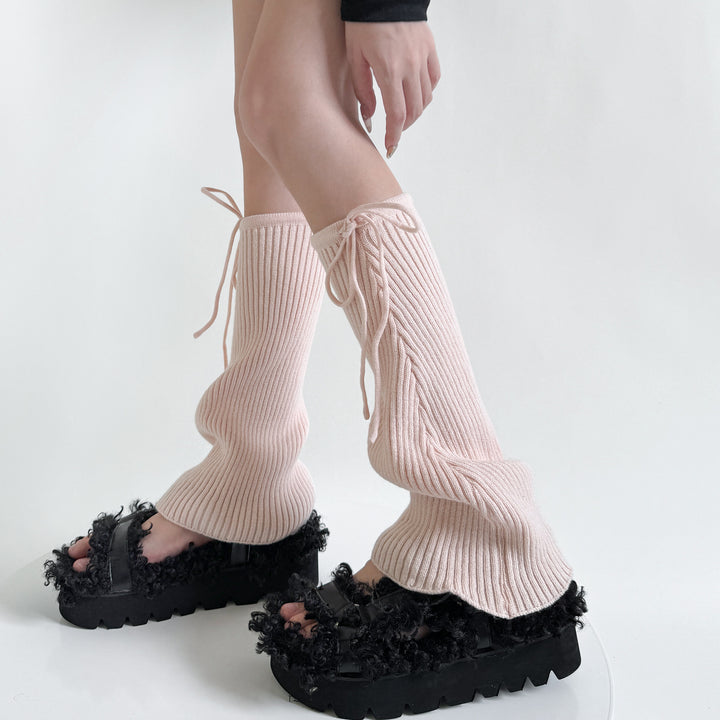 Pink flared ribbed leg warmers with tie