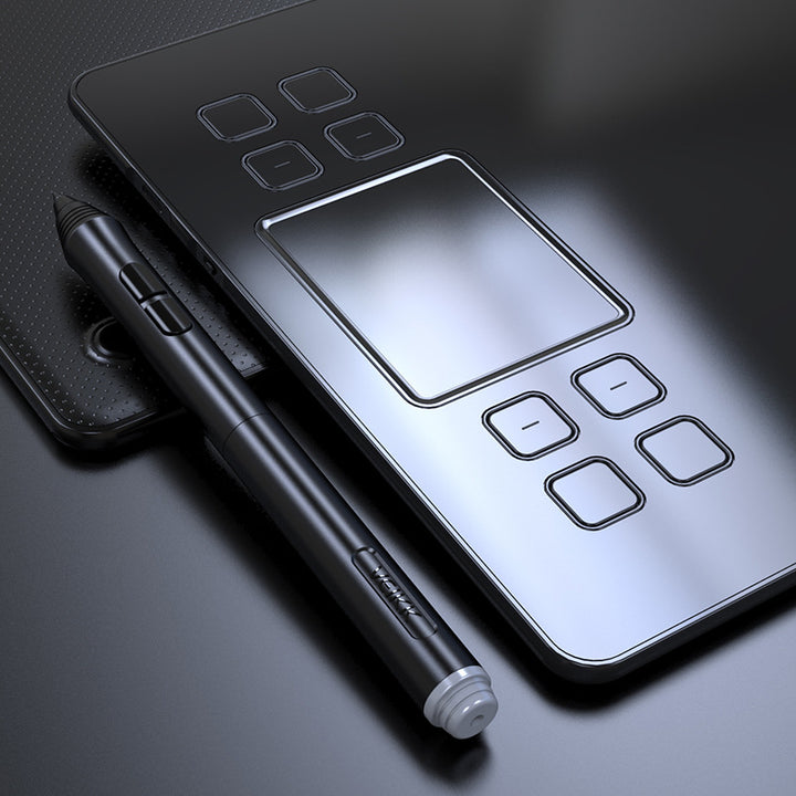 Graphics drawing tablet with stylus and pen stand