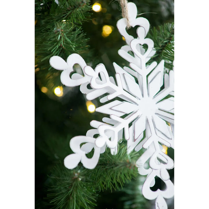 White metal snowflake hanging decorations with rope