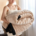 Sage green bubble fur blanket with black trim