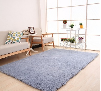 Fluffy beige shaggy rug in living room
