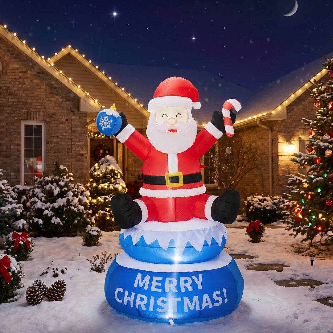 Inflatable Santa on rotating Merry Christmas base