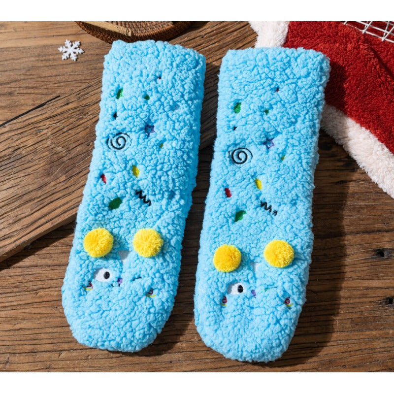 Fluffy yellow socks with embroidered face and pompoms
