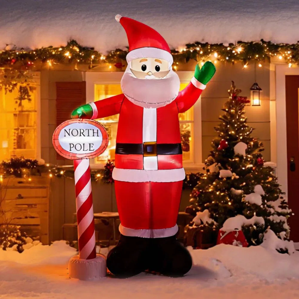 Giant inflatable Santa by North Pole sign