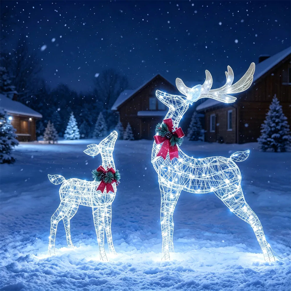 Two glittered light-up reindeer