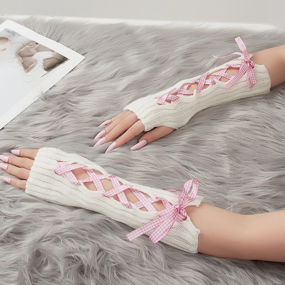 White long fingerless arm warmers with pink ribbon