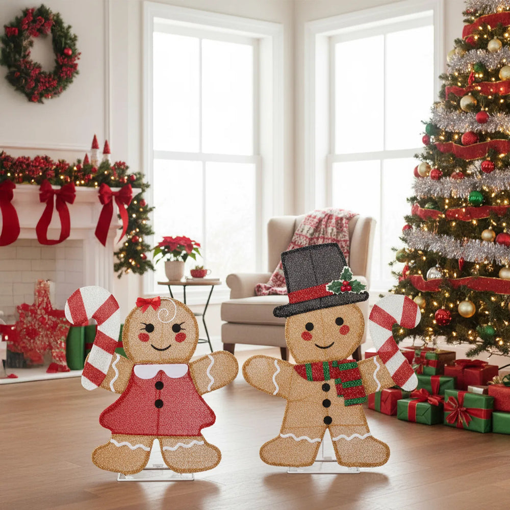 Two light-up gingerbread figures with candy canes