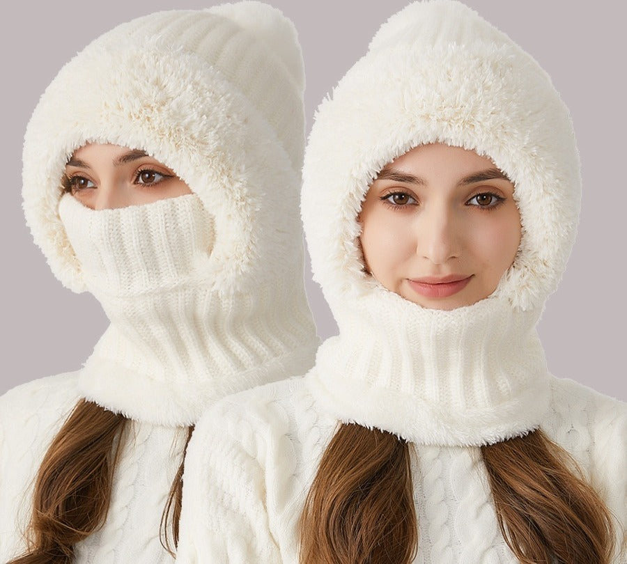 Woman wearing knitted hood with scarf