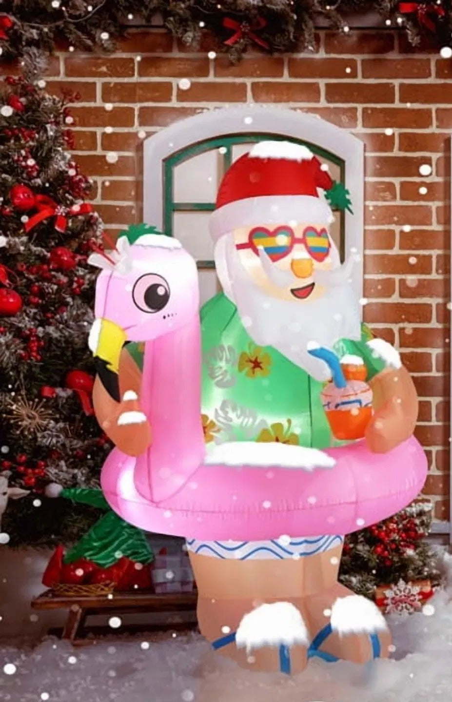 Inflatable Hawaiian Santa on flamingo float