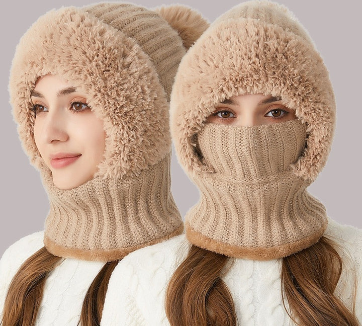 Woman wearing knitted hood with scarf