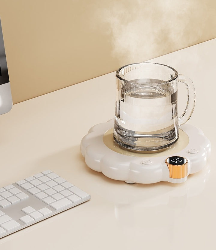 Flower-shaped mug warmer with cup of coffee