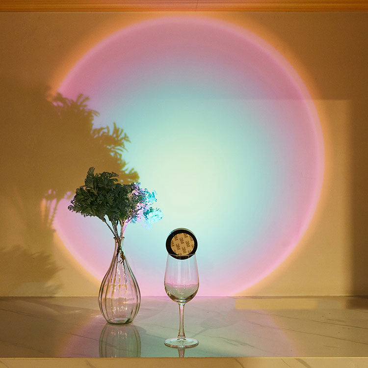 Round light casting sunset glow on wall