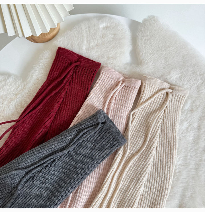 Pink flared ribbed leg warmers with tie