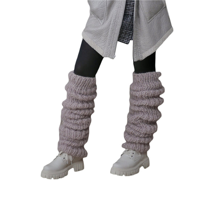Chunky slouchy knitted leg warmers over boots