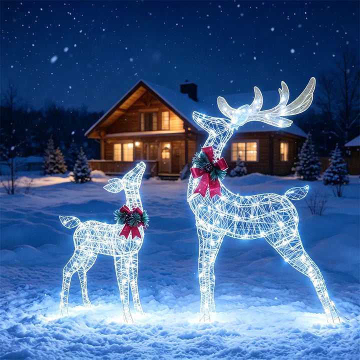 Two glittered light-up reindeer
