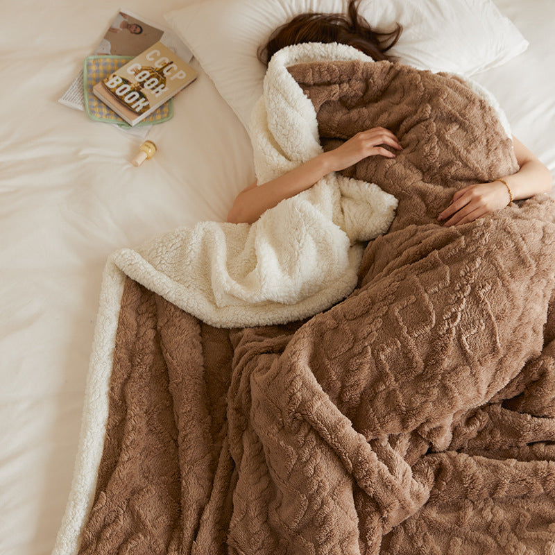 Tufted fleece throw draped over sofa