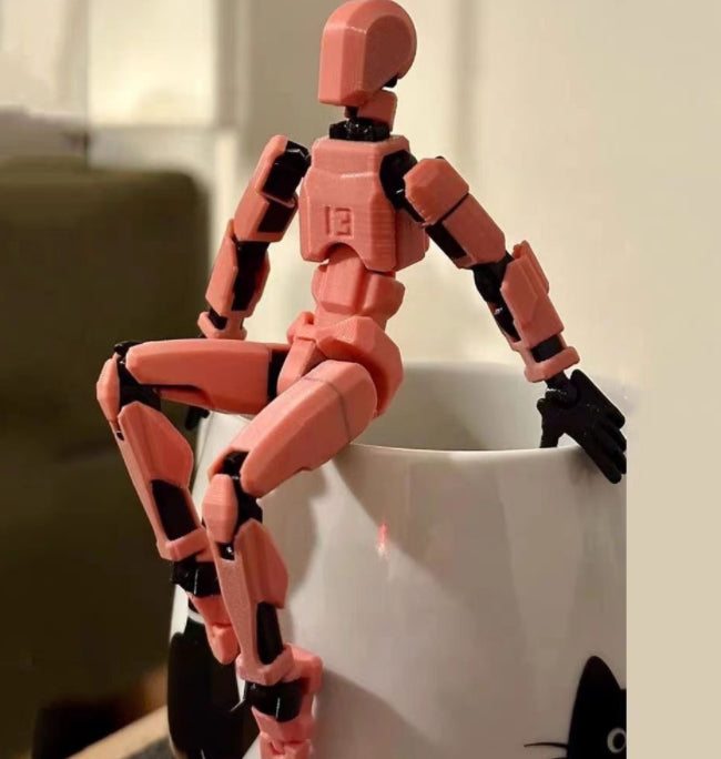 Cosycombe 3D-printed poseable robot figure with accessories