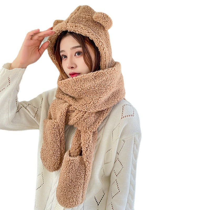 Woman wearing teddy hood scarf with bear ears