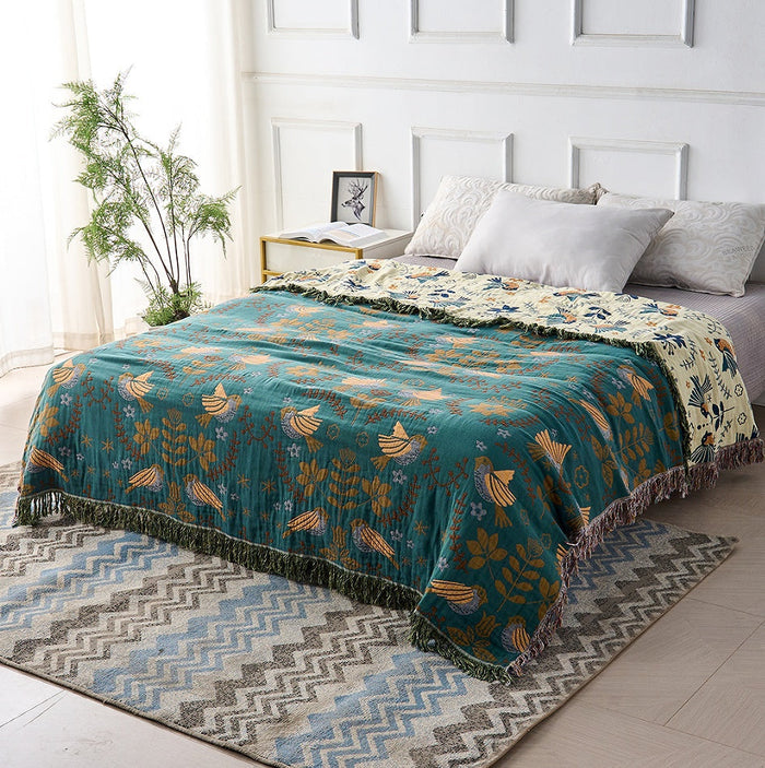 Cosycombe™ Reversible Teal and Cream Throw With Birds and Fringed Edges