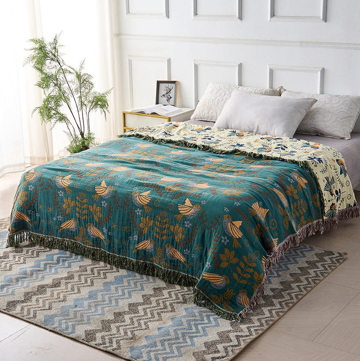 Cosycombe™ Reversible Teal and Cream Throw With Birds and Fringed Edges