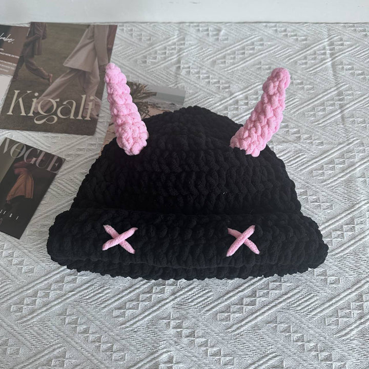 Black crochet bucket hat with pink horns