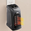small white plug-in ceramic heater with digital display