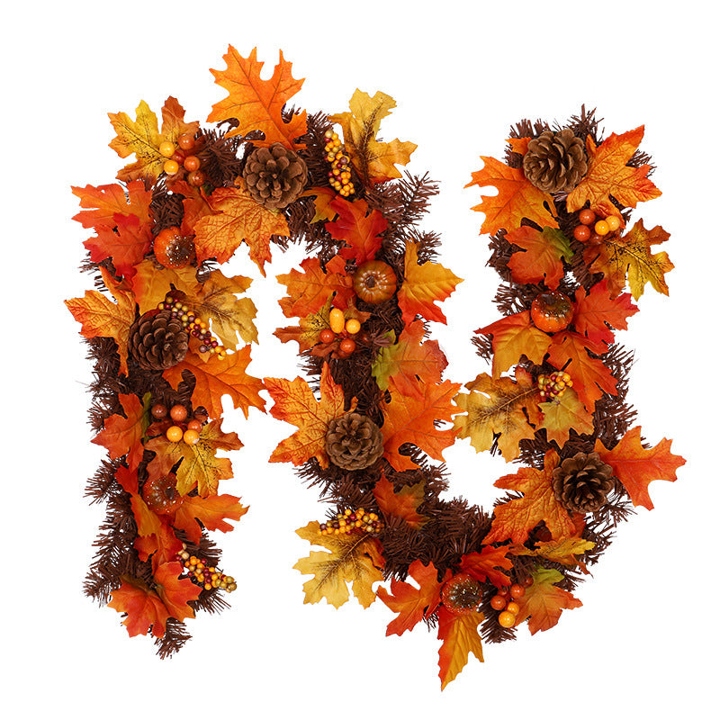 Autumn maple leaf garland on a mantel