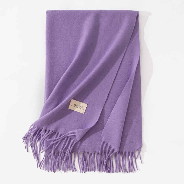Woman wearing wide soft shawl scarf
