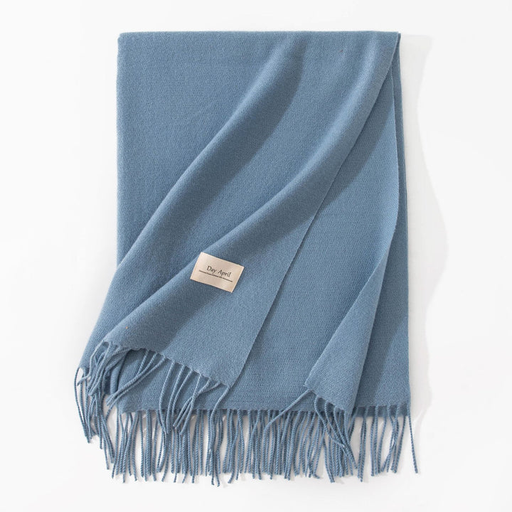 Woman wearing wide soft shawl scarf